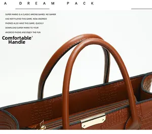 Detail of dark brown crocodile embossed leather tote with golden zipper and sturdy handles