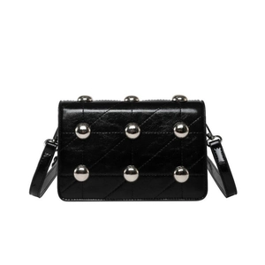 Retro black quilted crossbody bag with glossy finish and nine silver metal studs