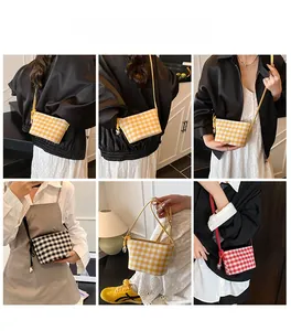 Detail shots of colorful plaid crossbody bags in yellow, black and red checkered patterns