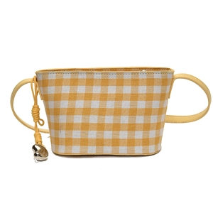 Yellow and white checkered canvas shoulder bag with heart pendant and leather strap