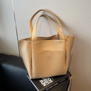 Minimalist beige pebble leather tote bag for women with spacious open front pocket