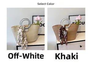 Detail of woven tote bags in off-white and khaki with metal handles and silk scarves