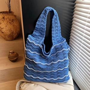 Blue and white wave pattern knitted tote bag with textured crochet fabric for women