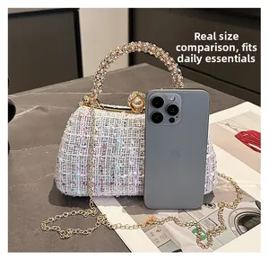 Size comparison of sequined tweed evening bag with pearl clasp and rhinestone handle