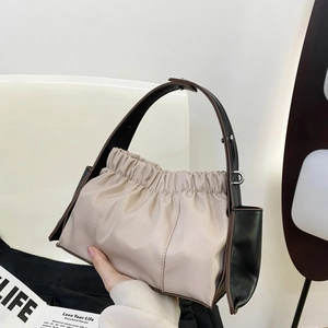 Retro pleated shoulder bag for women in beige nylon with contrast leather trim