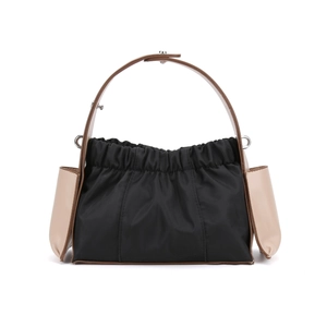 Vintage pleated shoulder bag in black nylon with contrasting brown leather handles and side pockets