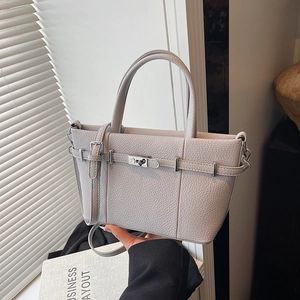 Minimalist light purple lychee pattern tote bag with silver buckle and crossbody strap