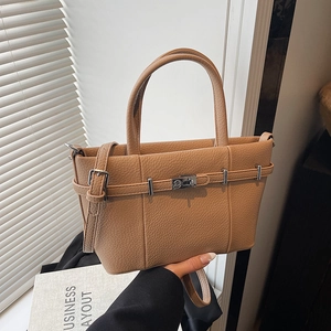 Fashionable caramel lychee leather tote bag with silver turn-lock and crossbody strap