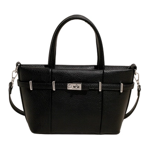 Minimalist black pebble grain tote bag with silver twist lock and detachable shoulder strap