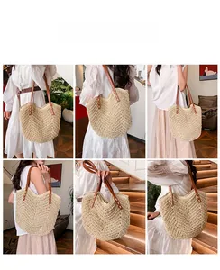 Detail of woven straw tote bag with brown leather straps and cross-stitch texture