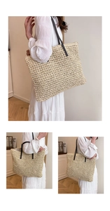 Détail d'un sac cabas tissé beige avec de fines anses noires porté sur un modèle