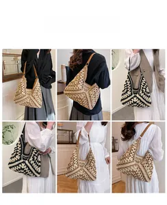 Detail of hand-woven crochet hobo bag featuring hollow texture and adjustable leather strap