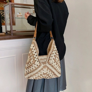 Handwoven oversized shoulder bag with beige and brown geometric patterns for daily leisure