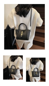 Detailed view of black litchi pattern leather bag with gold rectangular swivel lock