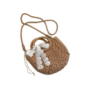 Natural straw crossbody bag with white lace bow and woven shoulder strap for summer