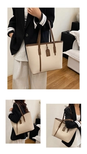 Detailed views of a large off-white tote bag with brown straps and stylish fashion tag