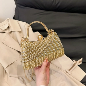 Champagne gold rhinestone evening clutch with pearl clasp and chain strap