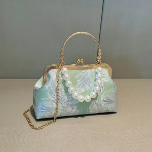 Light green floral brocade shell bag with pearl handle and golden chain strap