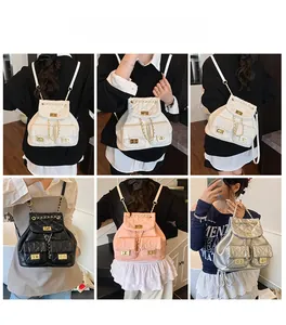 Detail of quilted backpack with chain straps and dual front pockets in various colors