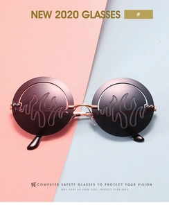 Détail macro de lunettes de soleil rondes avec motifs de flammes sur les verres teintés