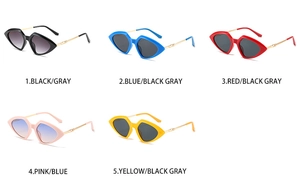 Detail view of small triangle metal sunglasses in black, blue, red, pink, and yellow colors