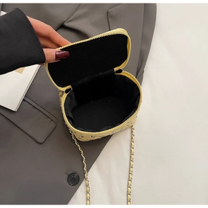 Internal view of yellow quilted mini box bag with silver rhinestones and chain strap