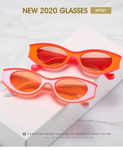 Detailansicht der Cat-Eye-Sonnenbrille mit orangefarbenen und rosa Rahmen auf Displays