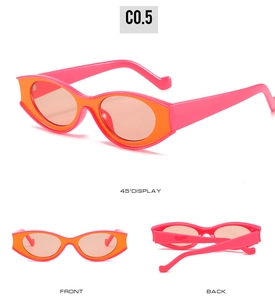 Drei Ansichten einer Retro-Katzenaugen-Sonnenbrille mit pinken und orangen Rahmen