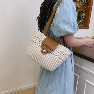 Chic woven tote bag in cream white with brown leather flap and pearl button detail