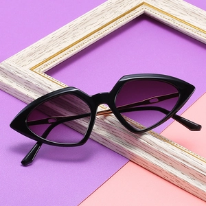 Modern geometric cat-eye sunglasses with purple gradient lenses and black metal frames