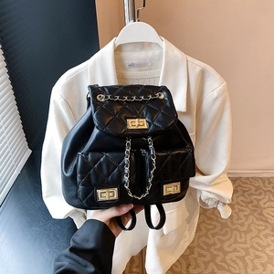 Elegant black quilted leather backpack with gold clasp and chain straps for women