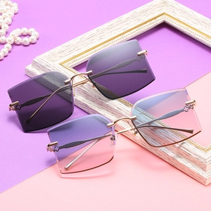 Fashionable rimless square gradient sunglasses with gold wavy metal temples for women