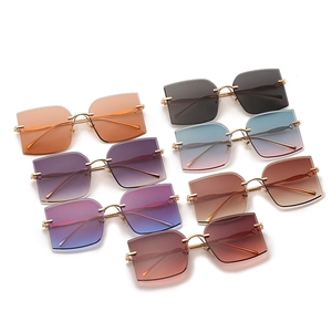 Fashionable rimless square sunglasses with gold metal temples in seven varied gradient colors