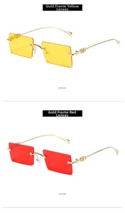 Detail of vintage rimless rectangle sunglasses with gold hollow temples and ocean lenses