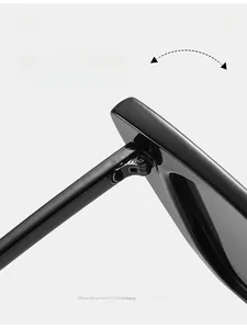 Macro detail of a durable metallic texture hinge on black small frame sunglasses