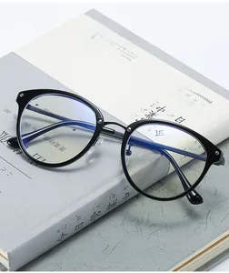 Macro shot of TR90 glasses frame showing anti-blue light lenses and metal rivets