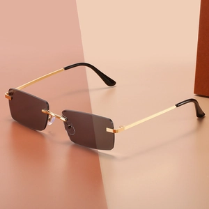 Lunettes de soleil rectangulaires sans monture avec verres gris et métal doré