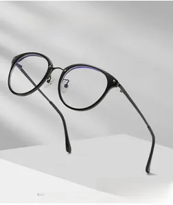 Detailed close-up of retro black TR90 round frame with anti-blue ray protective lenses