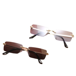 Lunettes de soleil rétro carrées sans monture avec verres dégradés et branches dorées