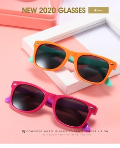 Detail of two-pack flexible silicone sunglasses for children in bright contrast colors