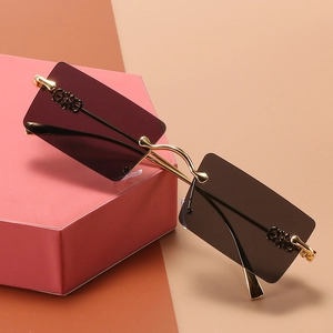 Rectangle rimless sunglasses with purple gradient lenses and gold metal temples