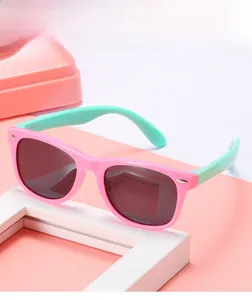 Detail of pink and green polarized silicone sunglasses for kids with UV protection