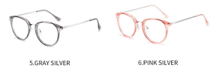 Gray and pink round TR90 eyeglasses with thin silver metal temples on white background