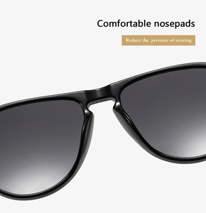 Detail of integrated nose pads on black sunglasses designed to reduce wearing pressure