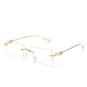 Vintage frameless rectangular sunglasses with gold metal C-décor temples and clear lenses