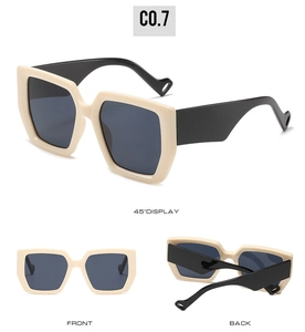Three-angle view of oversized square sunglasses in cream and black contrast design