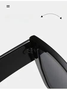 Macro view of durable metal hinge on stylish oversized black square sunglasses