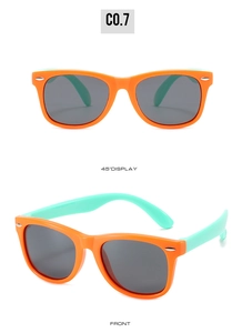Detailed front and side views of orange and mint green polarized kids sunglasses