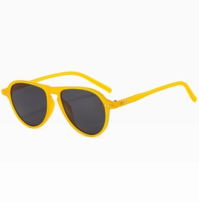 Detail of yellow translucent aviator sunglasses with double bridge and metal rivets
