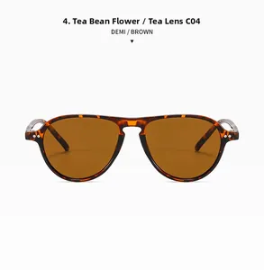 Detailed close-up of retro sunglasses with demi brown tortoise frame and brown lenses